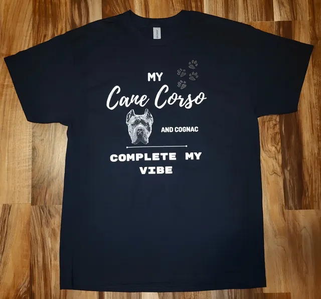 Black t-shirt reading "My Cane Corso and Cognac complete my vibe"
