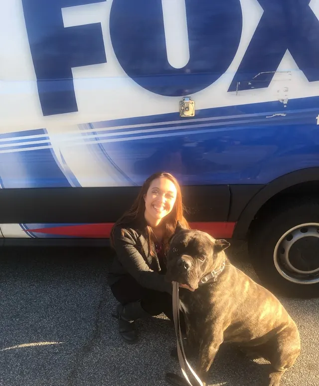Pedro with a Fox 5 Atlanta reporter beside the news van